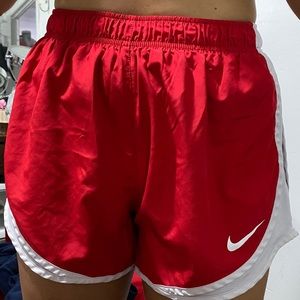Red Nike shorts